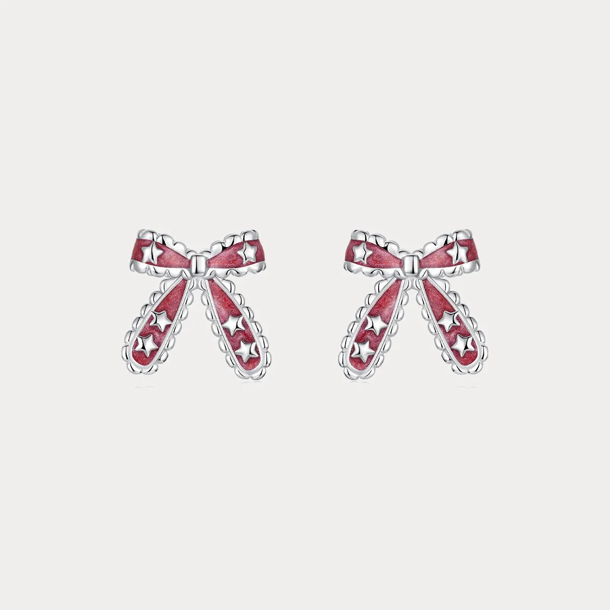 Christmas Bow Star Earrings sold by Selenichast