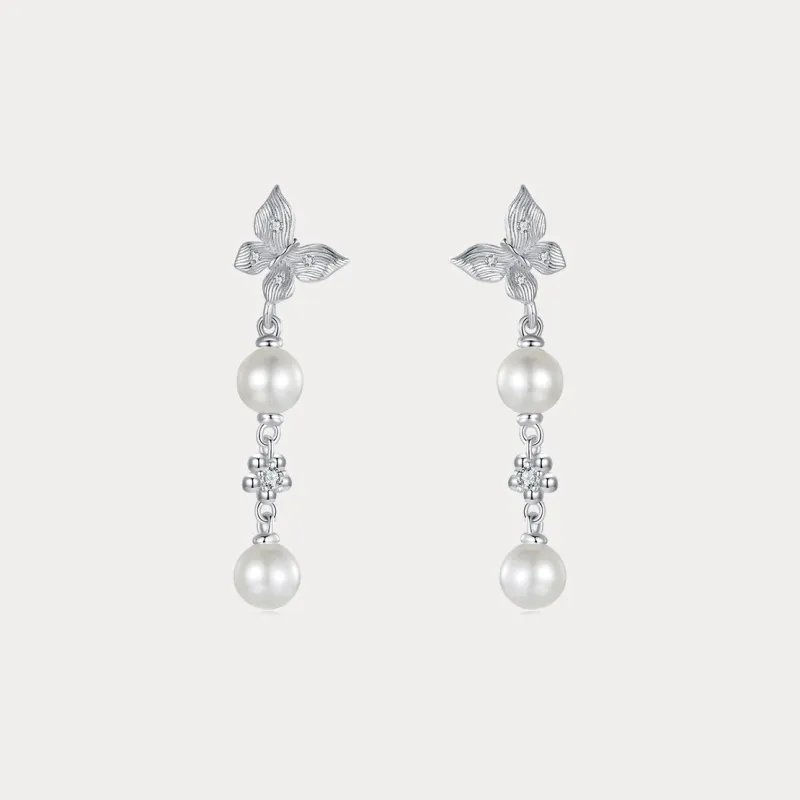Silver Butterfly Pearl Drop Earrings sold by Selenichast