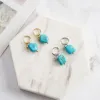 Star Turquoise Dangling Earrings sold by Selenichast
