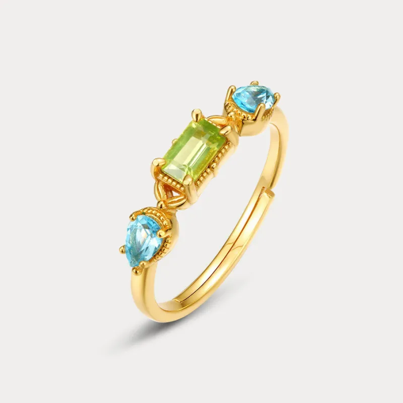 Peridot and Topaz Ring sold by Selenichast