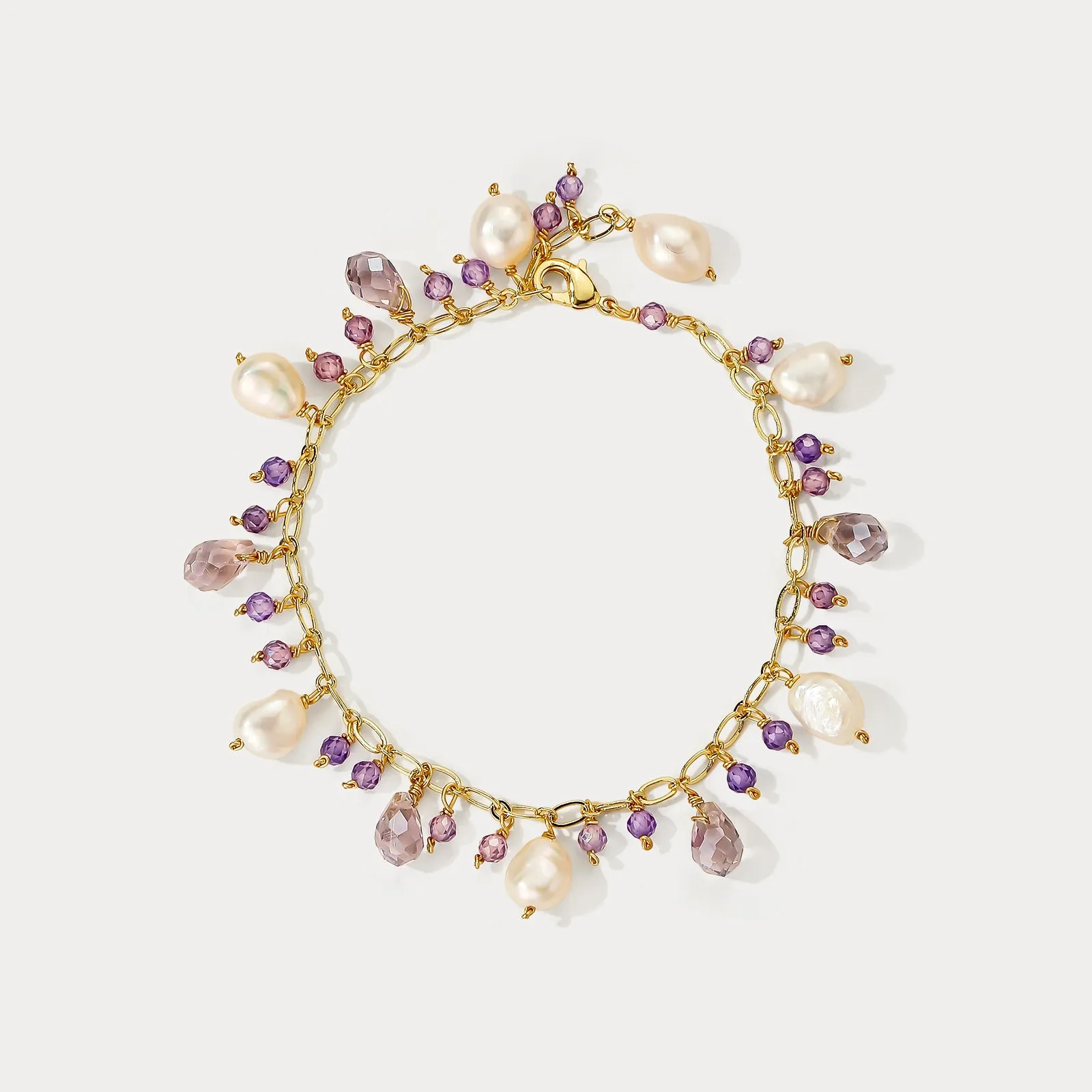 Amethyst Pearl Charm Bracelet sold by Selenichast