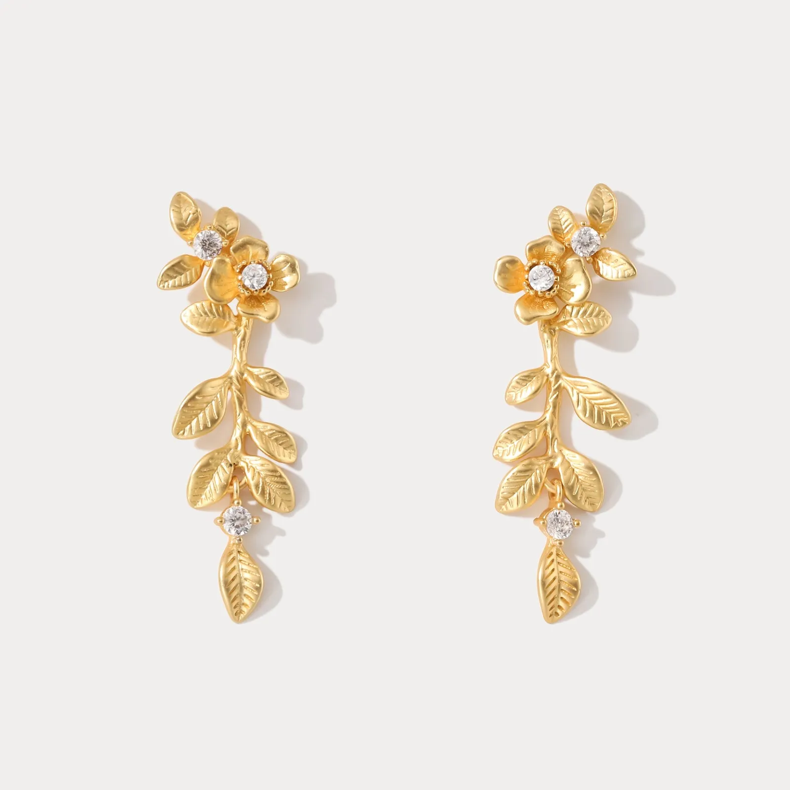 Gold Floral Leaf Drop Earrings sold by Selenichast