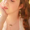 Lily Of The Valley Tassel Earrings sold by Selenichast