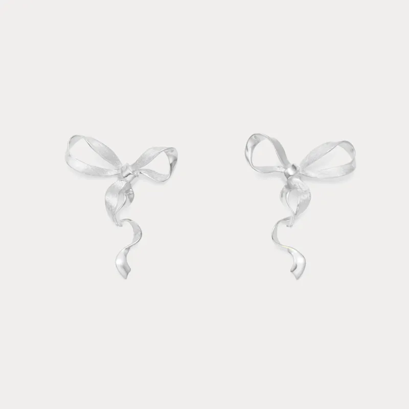 Silver Bow Earrings sold by Selenichast