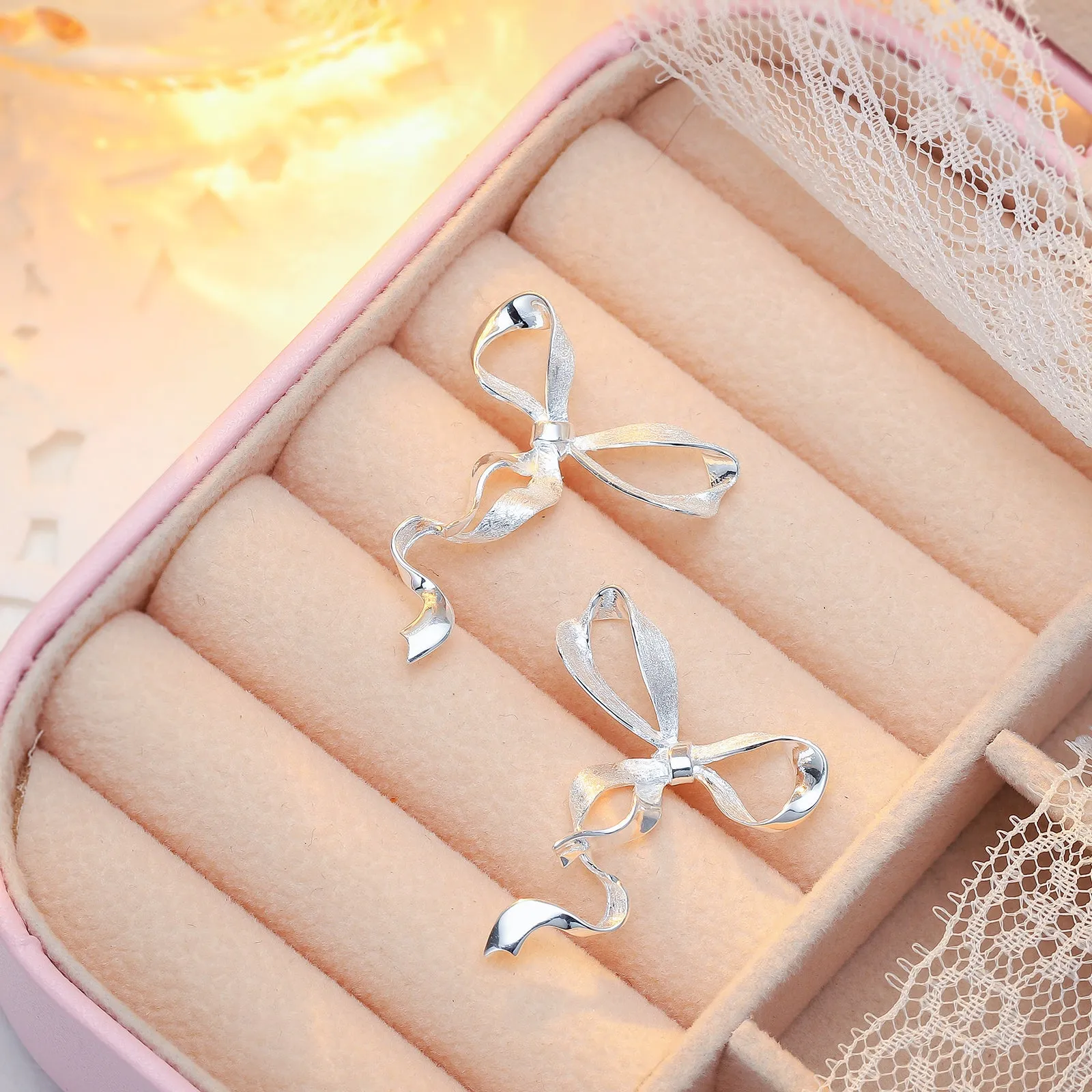 Silver Bow Earrings sold by Selenichast product image thumbnail 2