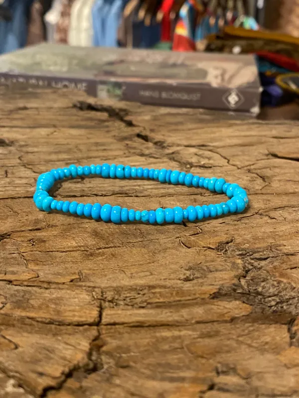 Sleeping Beauty Turquoise Mixed Rondelle Bead Stretch Bracelet sold by Cave and Post