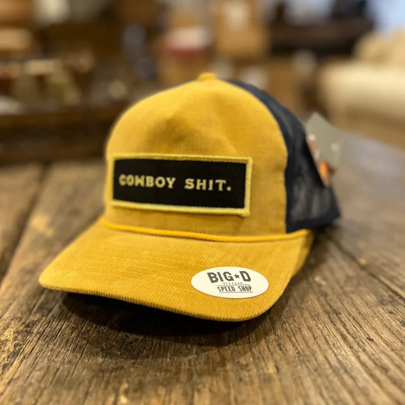 Cowboy $h!t Trucker - Black Patch on Yellow/Blue Trucker sold by Cave and Post