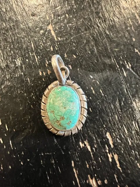 Signed Sterling and Turquoise Pendant sold by Cave and Post