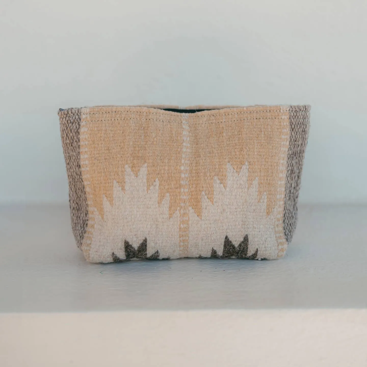 Artisan Made Beige Handwoven Wool Clutch sold by Cave and Post