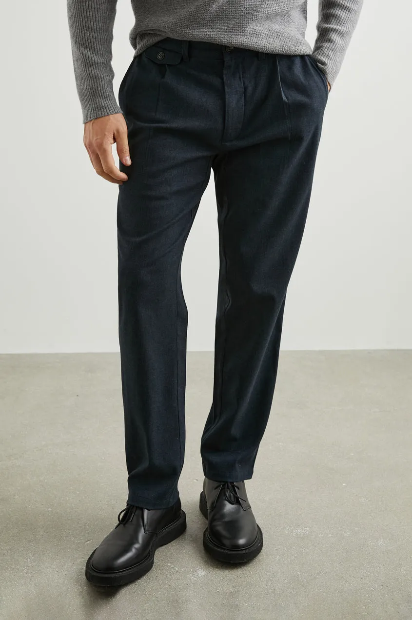 Marcellus Pant - Dark Navy Melange sold by Cave and Post