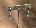 Sterling Silver and Turquoise Dangle Earrings sold by Cave and Post