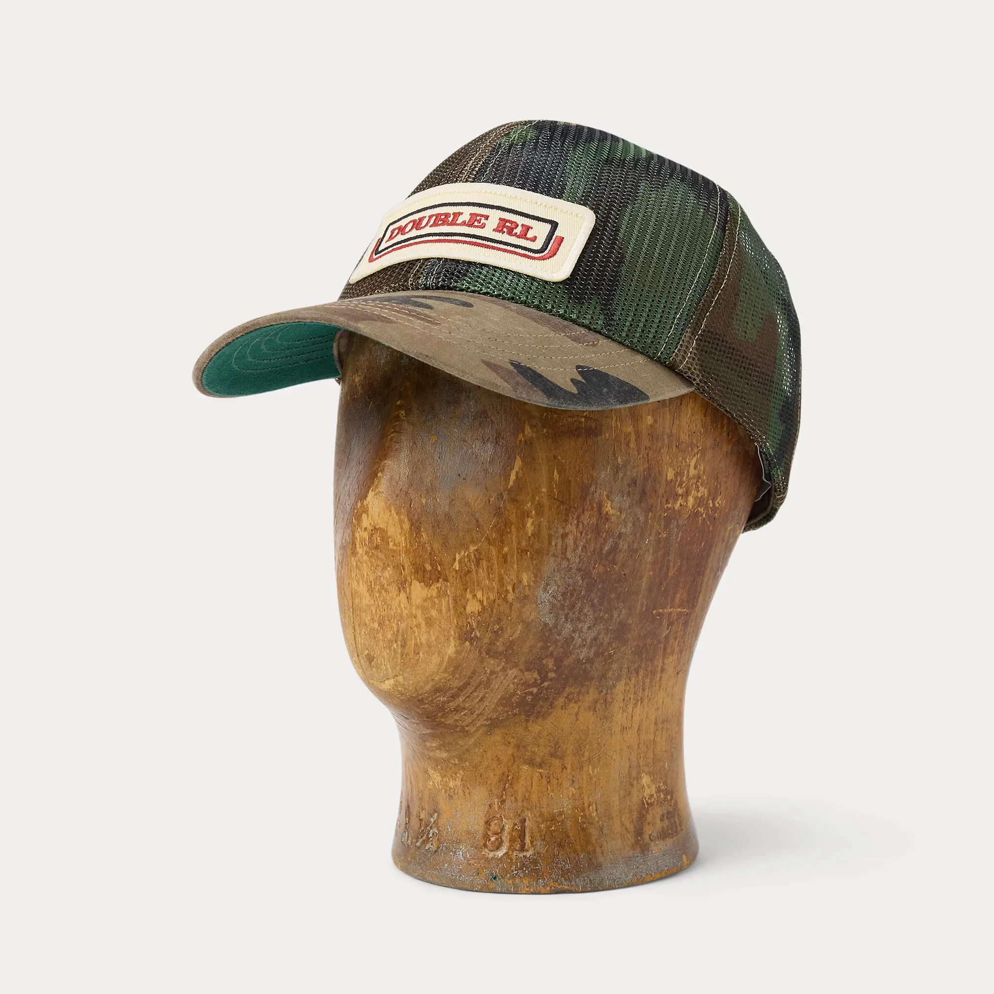 RRL Camo Mesh Trucker Cap sold by Cave and Post