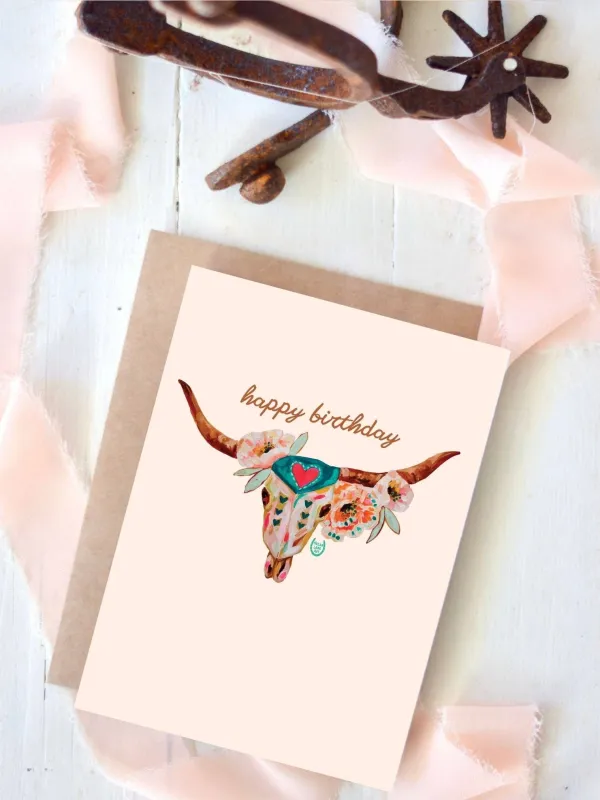 Western Cowgirl Steer Skull Floral Birthday Card sold by Cave and Post