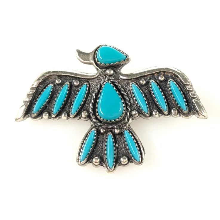 VINTAGE NATIVE AMERICAN STERLING TURQUOISE THUNDERBIRD BROOCH sold by Cave and Post