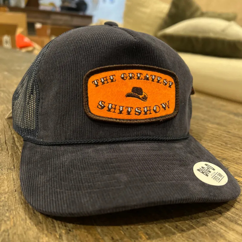 The Greatest $h!t$how - Orange Patch on Navy Corduroy Trucker sold by Cave and Post