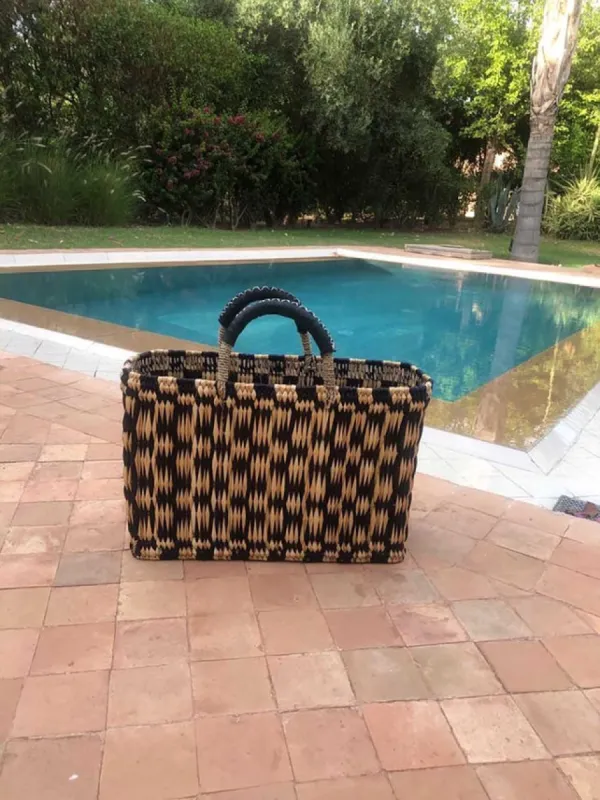 Medium Straw Basket Bicolor Checkers sold by Cave and Post