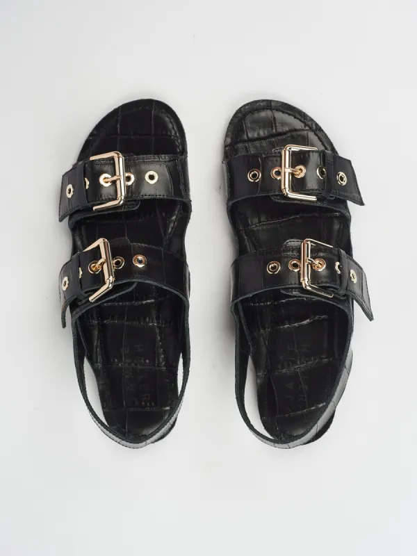 The Double Buckle Sandal in Black Croc sold by Jamie Haller