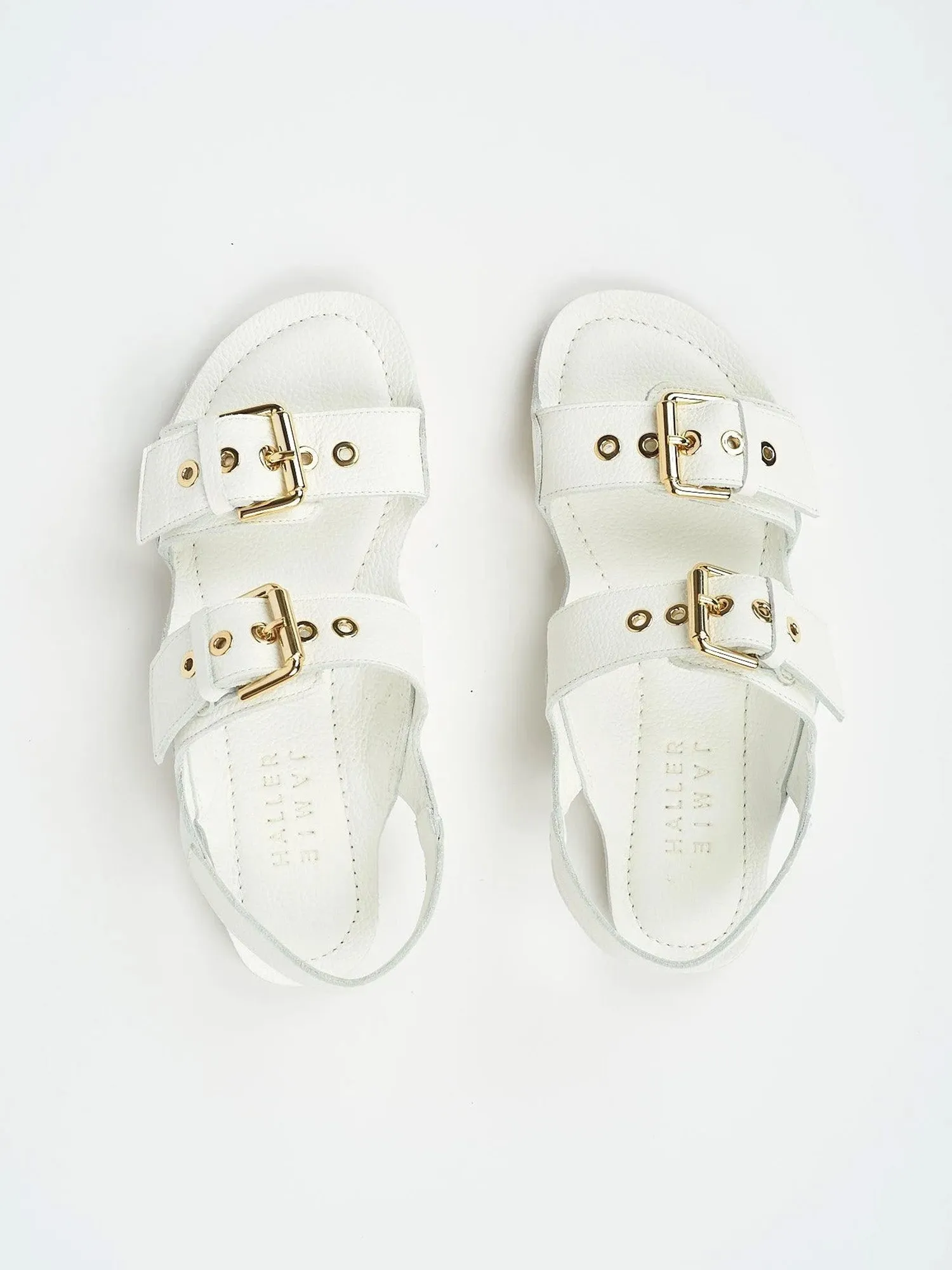 The Double Buckle Sandal in White sold by Jamie Haller