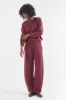 The Arc Lounge Pant in Cherry Cola sold by Jamie Haller