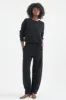 The Arc Lounge Pant in Black sold by Jamie Haller