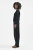 The Arc Lounge Pant in Black sold by Jamie Haller