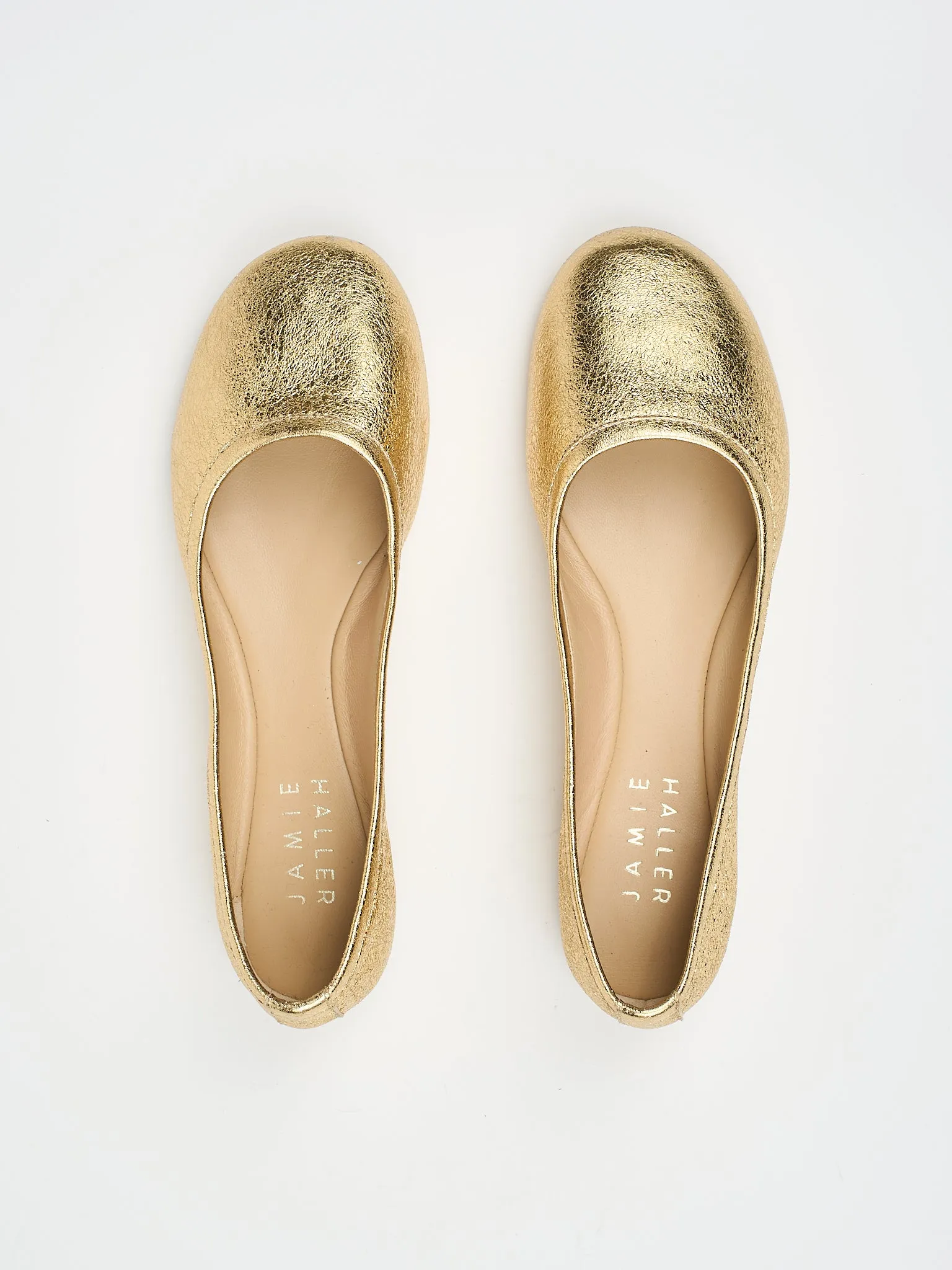 The Minimalist Slipper in Warm Gold sold by Jamie Haller