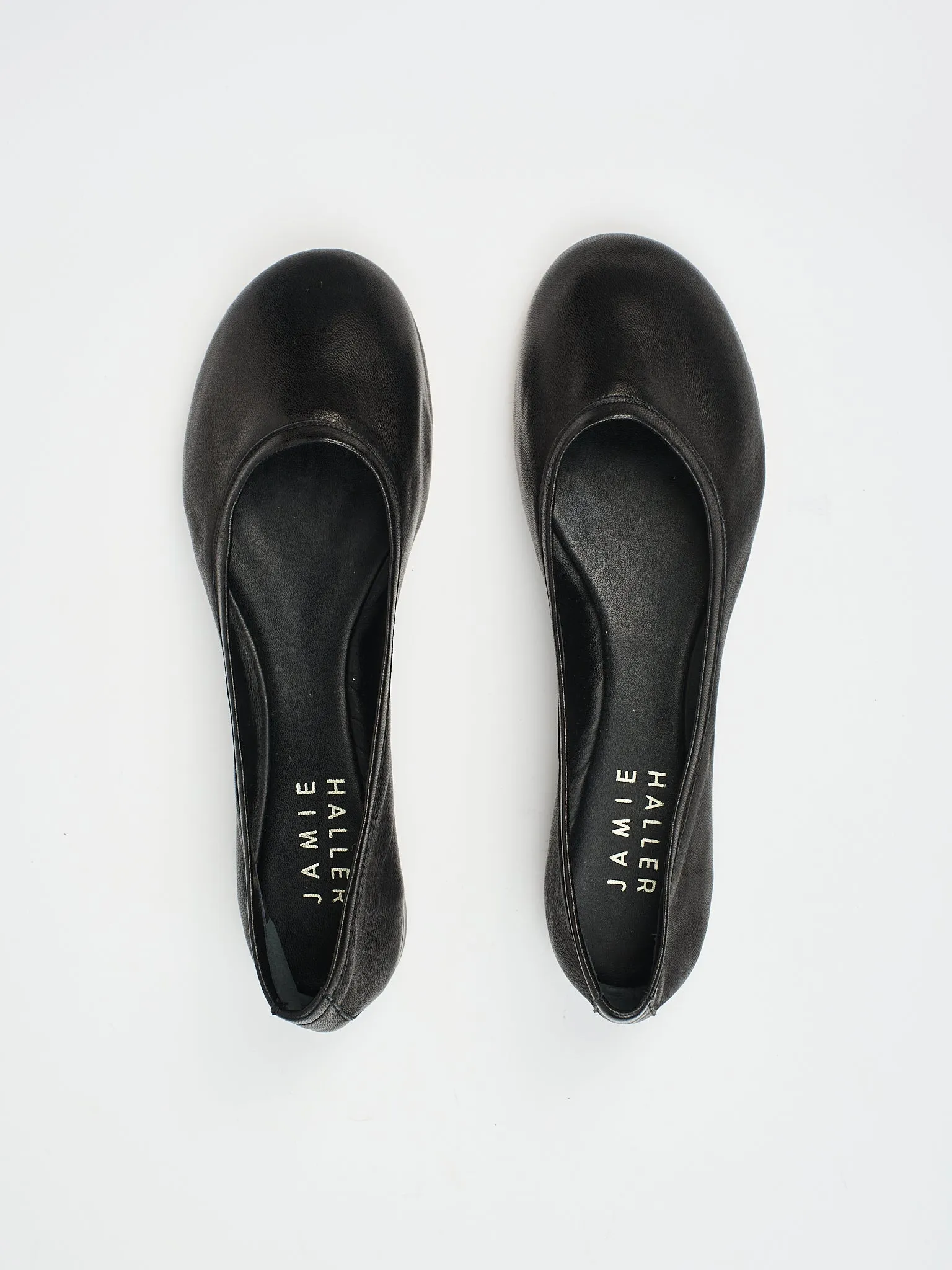 The Minimalist Slipper in Black sold by Jamie Haller