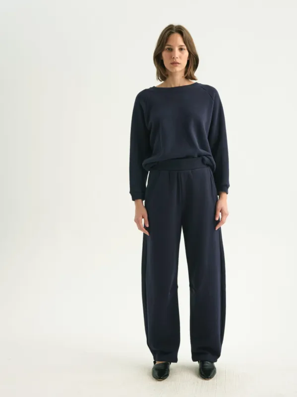The Arc Lounge Pant in Navy sold by Jamie Haller