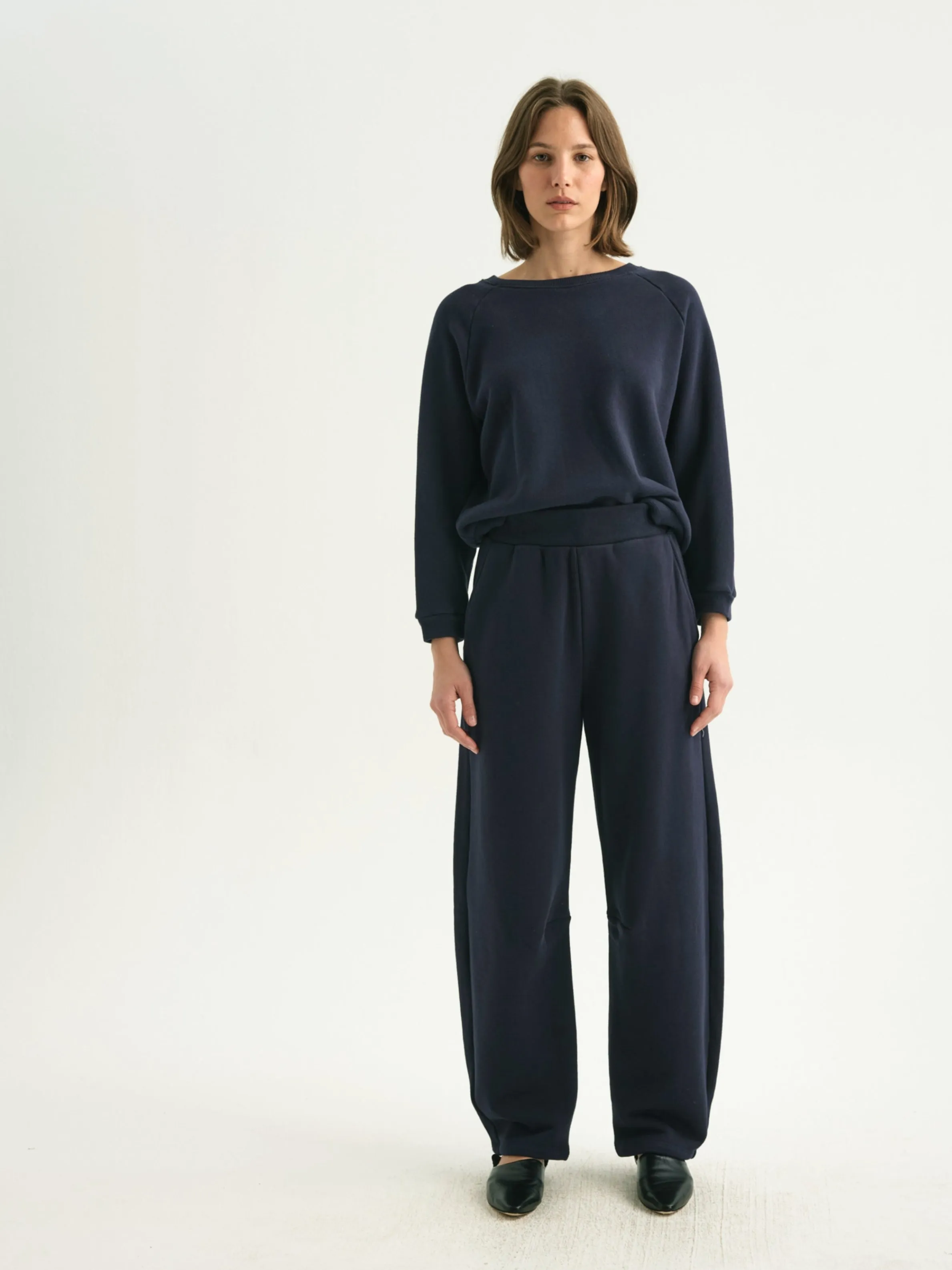 The Arc Lounge Pant in Navy sold by Jamie Haller