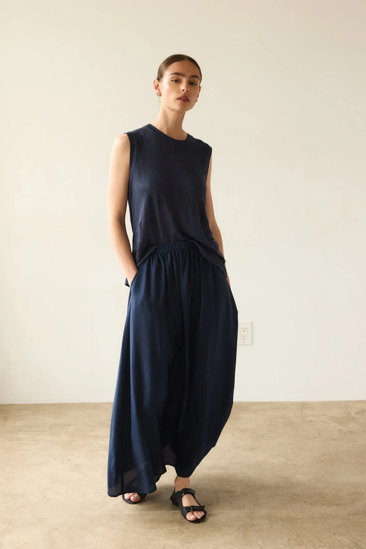 The Midi Swing Skirt in Navy sold by Jamie Haller