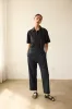 The Walking Sandal in Black sold by Jamie Haller
