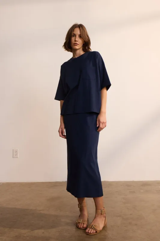 The Column Midi in Navy sold by Jamie Haller