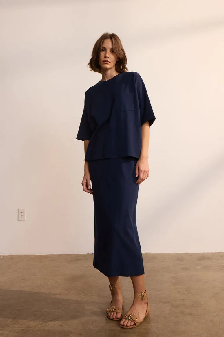 The Column Midi in Navy sold by Jamie Haller