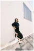 The Column Midi in Black sold by Jamie Haller