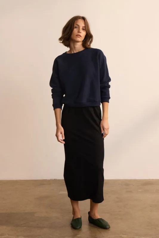 The Column Midi in Black sold by Jamie Haller