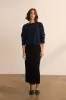 The Column Midi in Black sold by Jamie Haller