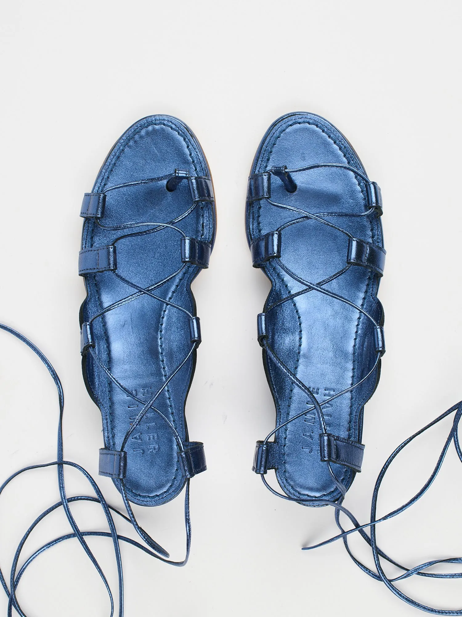 The Sparta Heel in Metallic Blue sold by Jamie Haller