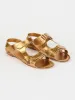 The Walking Sandal in Metallic Bronze sold by Jamie Haller
