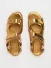 The Walking Sandal in Metallic Bronze sold by Jamie Haller