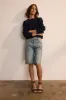 The Cut Knee Short in Worn Indigo sold by Jamie Haller