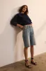 The Cut Knee Short in Worn Indigo sold by Jamie Haller