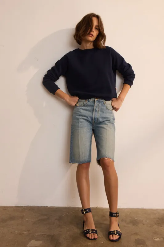 The Cut Knee Short in Worn Indigo sold by Jamie Haller