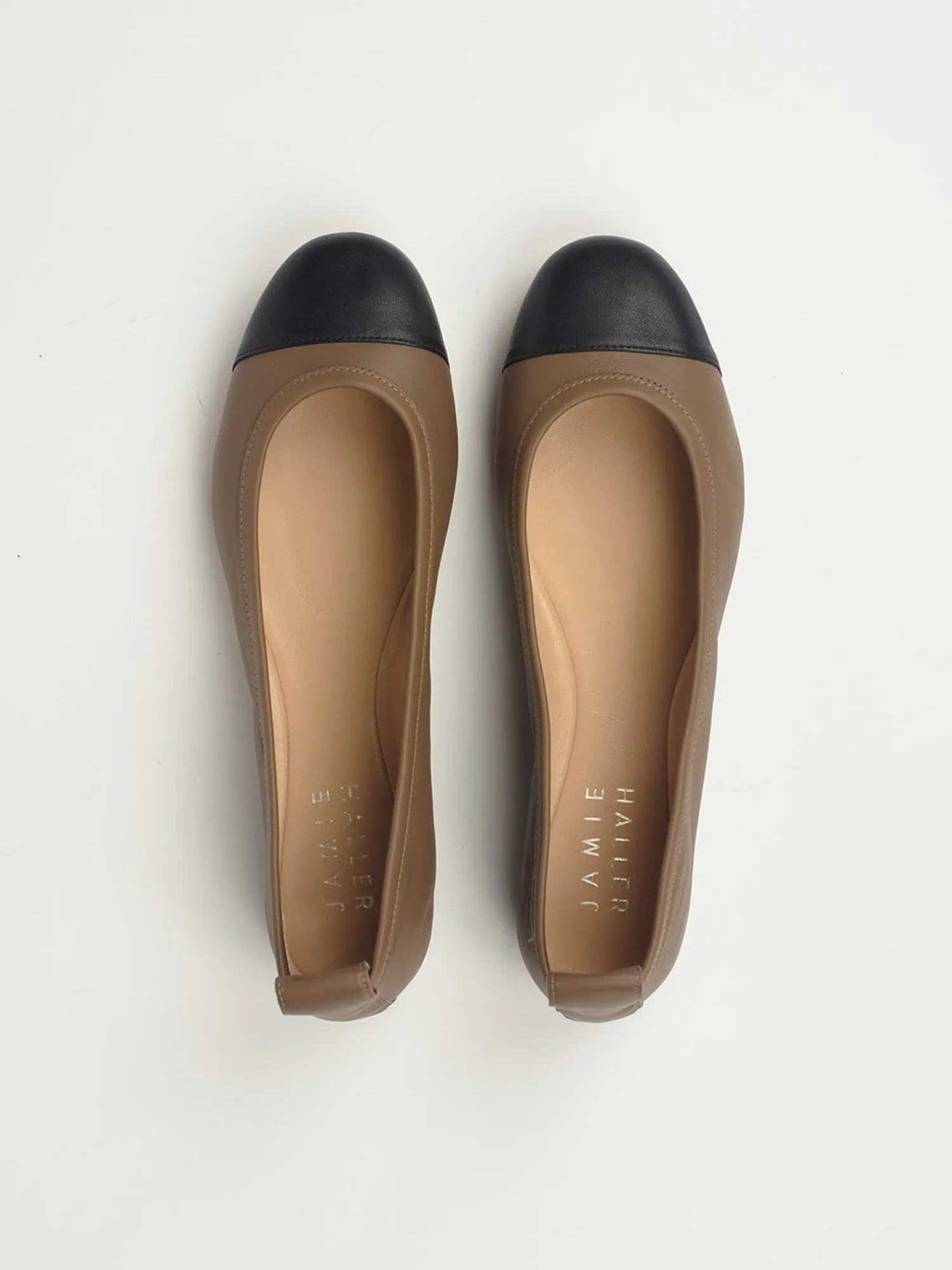 The Cap Toe Slipper in Taupe sold by Jamie Haller