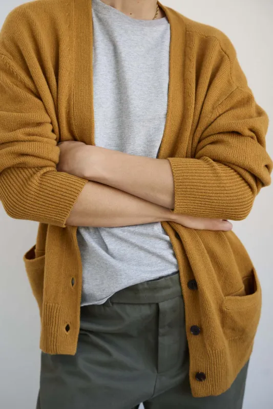 The Welt Pocket Cashmere Cardigan in Gold sold by Jamie Haller