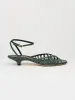 The Caged Kitty in Green Snake sold by Jamie Haller