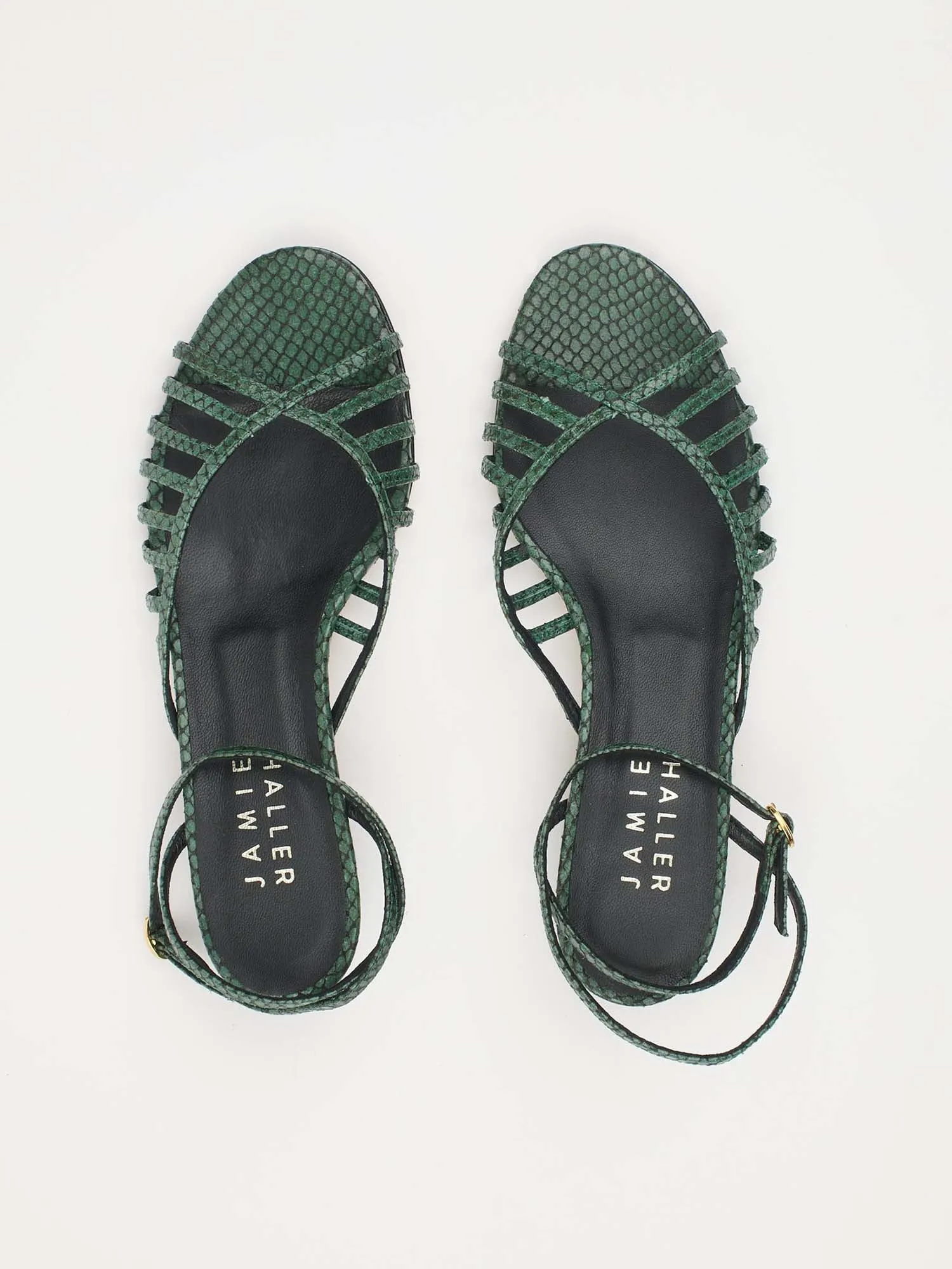 The Caged Kitty in Green Snake sold by Jamie Haller