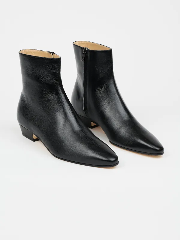 The Lennon Boot in High Black sold by Jamie Haller