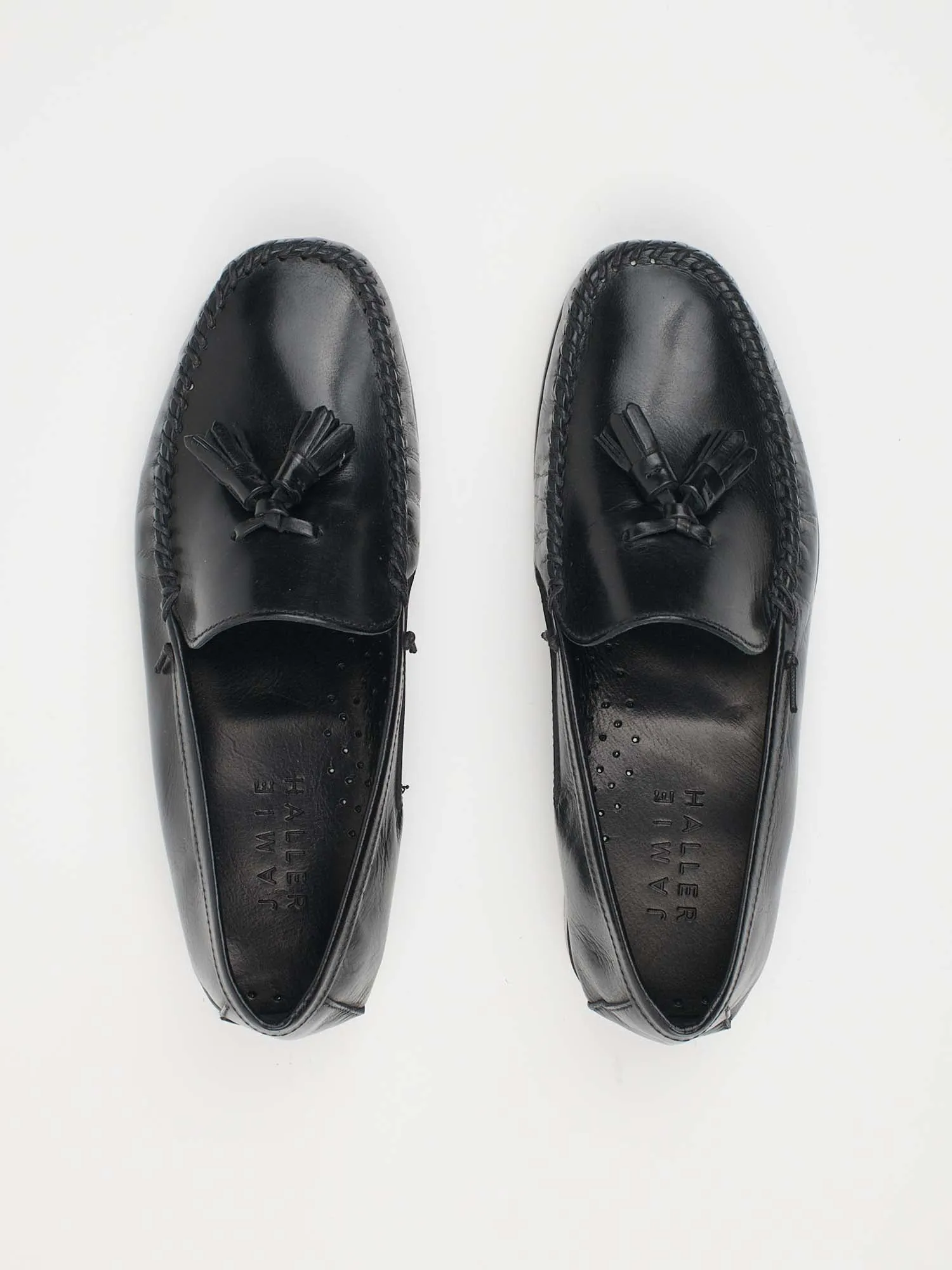 The Tasselo Moc Loafer in Black sold by Jamie Haller