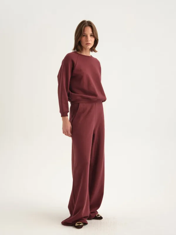 The Wide Leg Terry Trouser in Cherry Cola sold by Jamie Haller