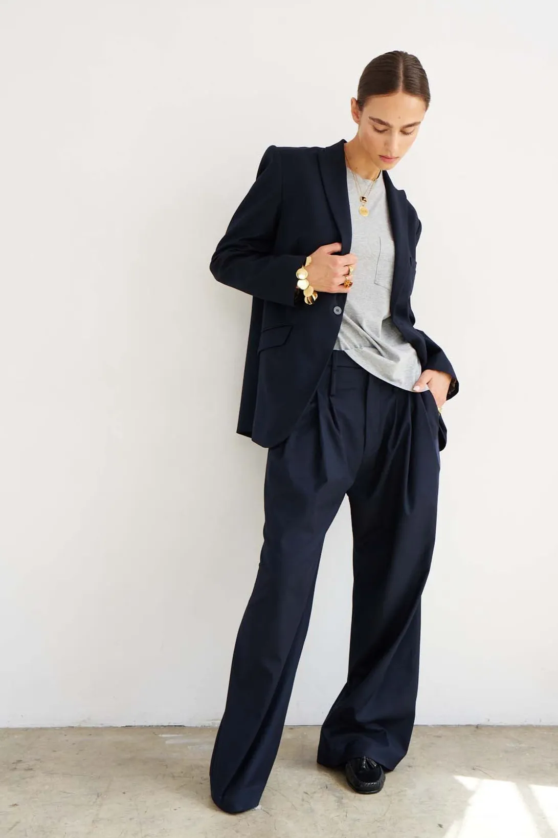 The Triple Pleat Trouser in Dark Navy sold by Jamie Haller